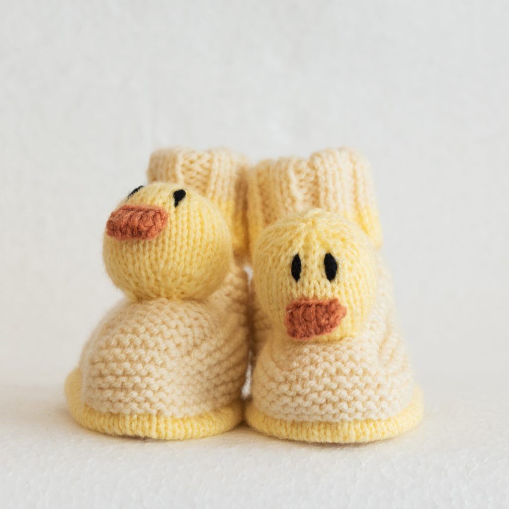knitted chicken booties in yellow