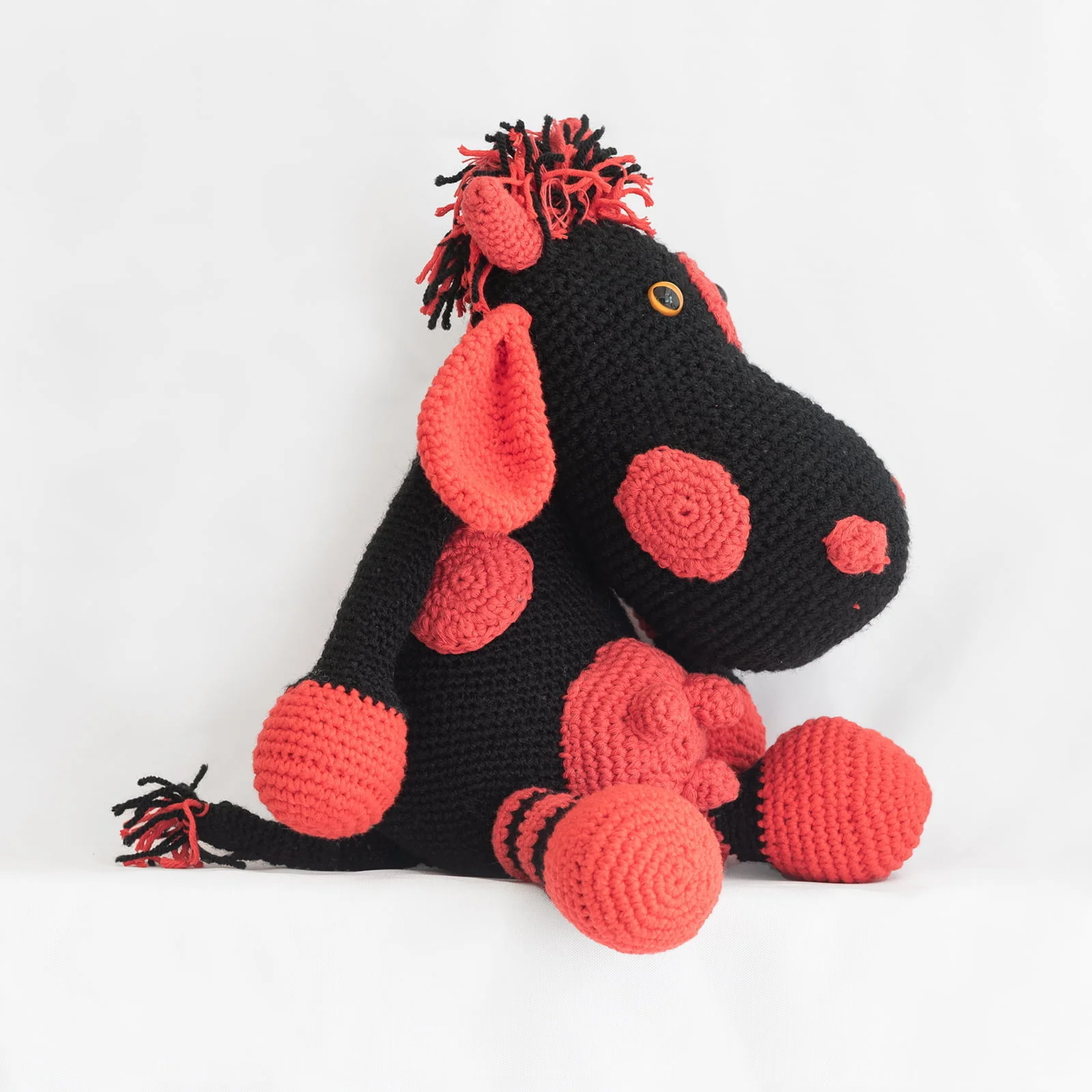 hand crochet black and red cow