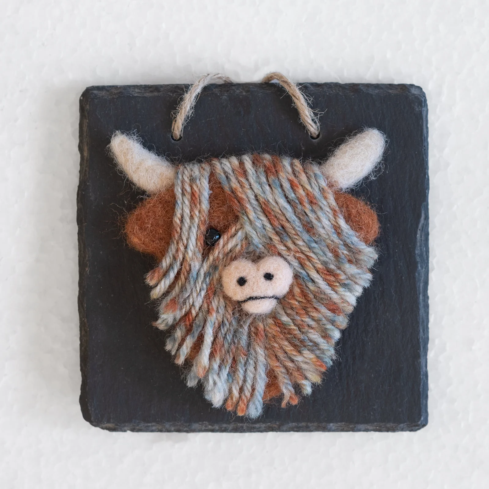 highland cow head on slate wall hanging