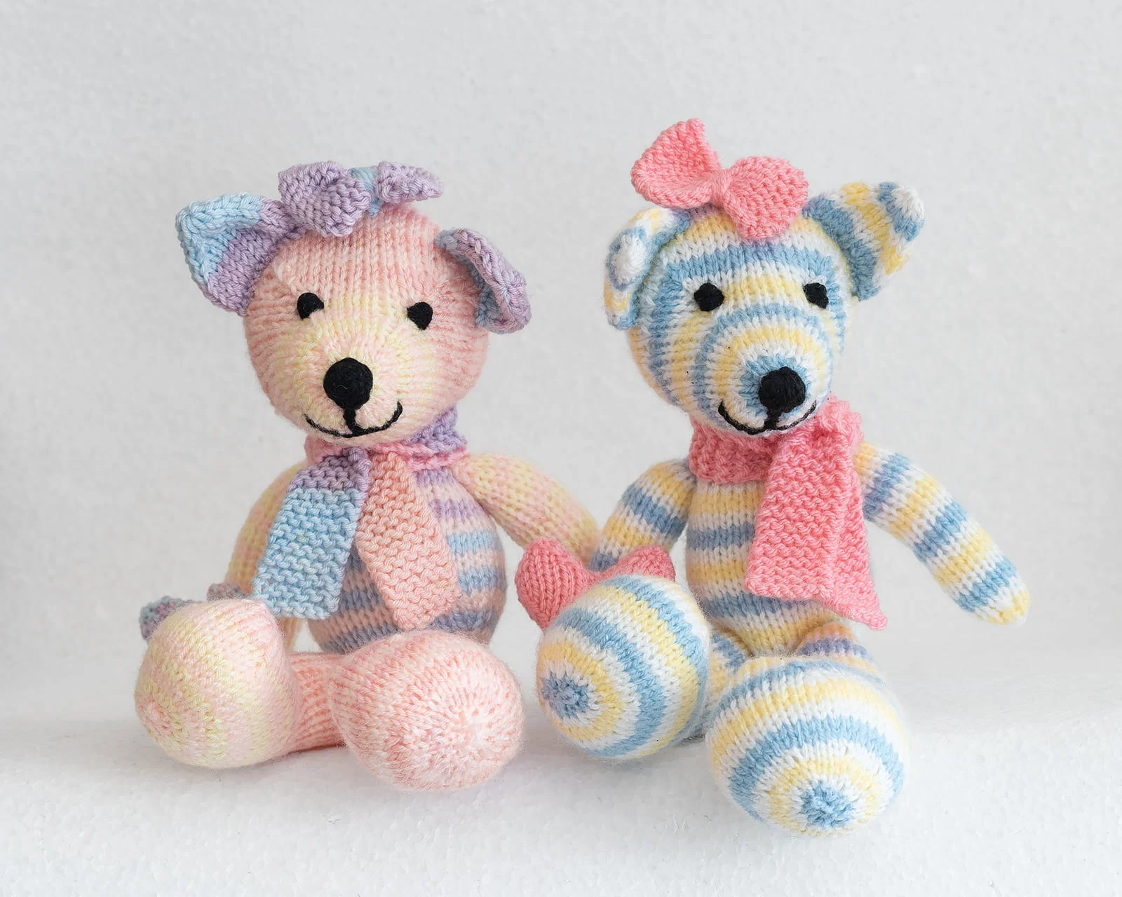 hand knitted pink blue teddies