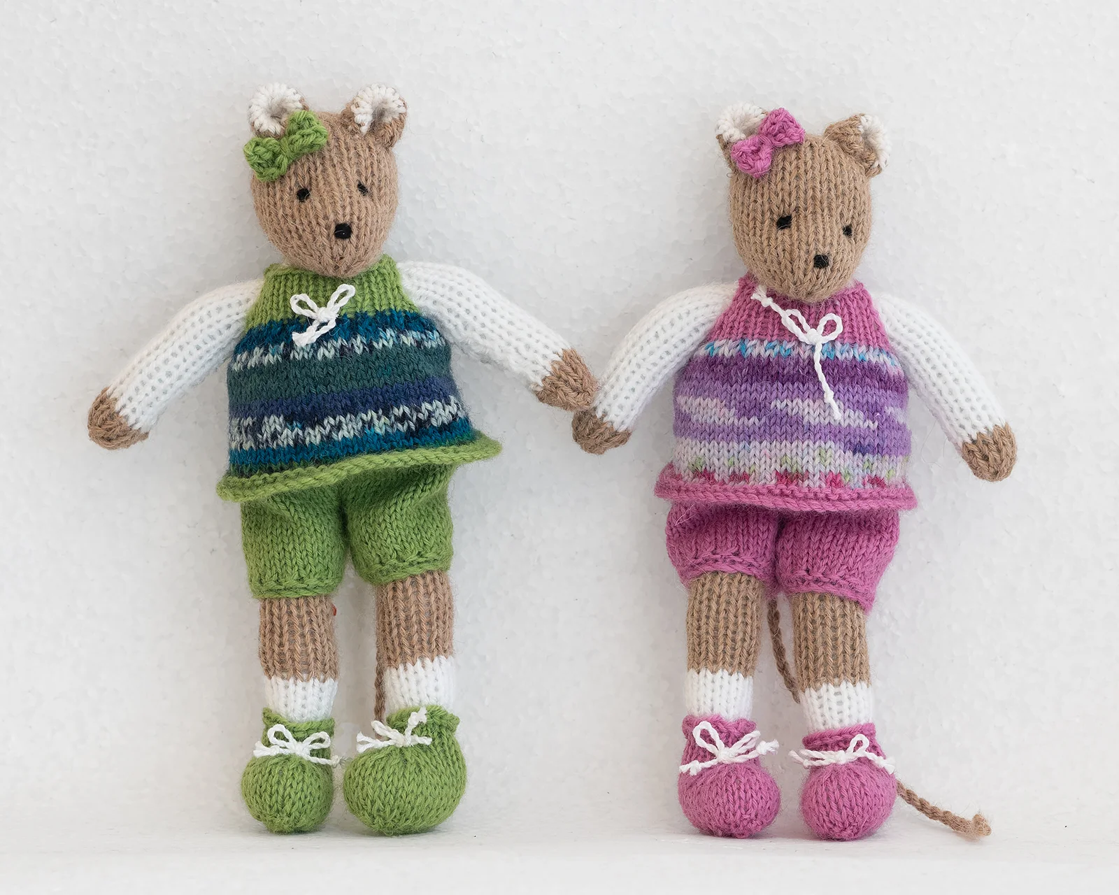 hand knitted mice friends green and pink