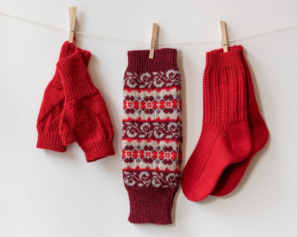 red hand knitted mats warmers socks