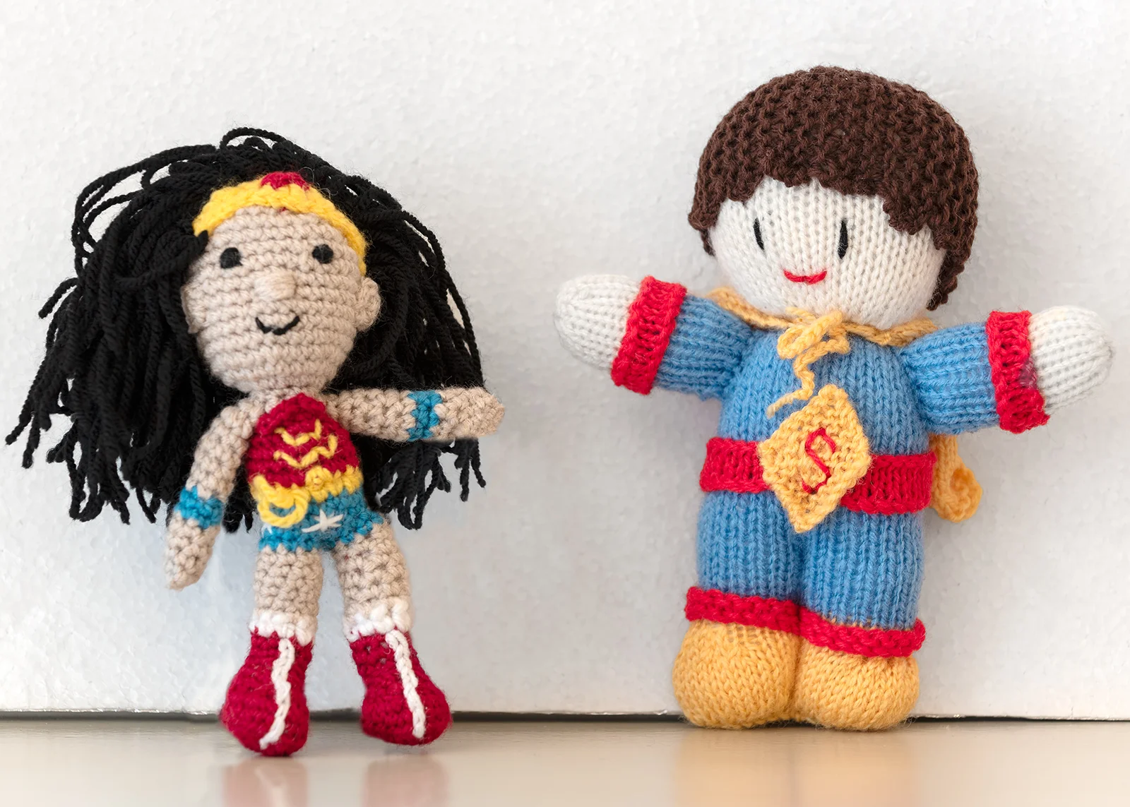 hand knitted crochet wonder woman and superman