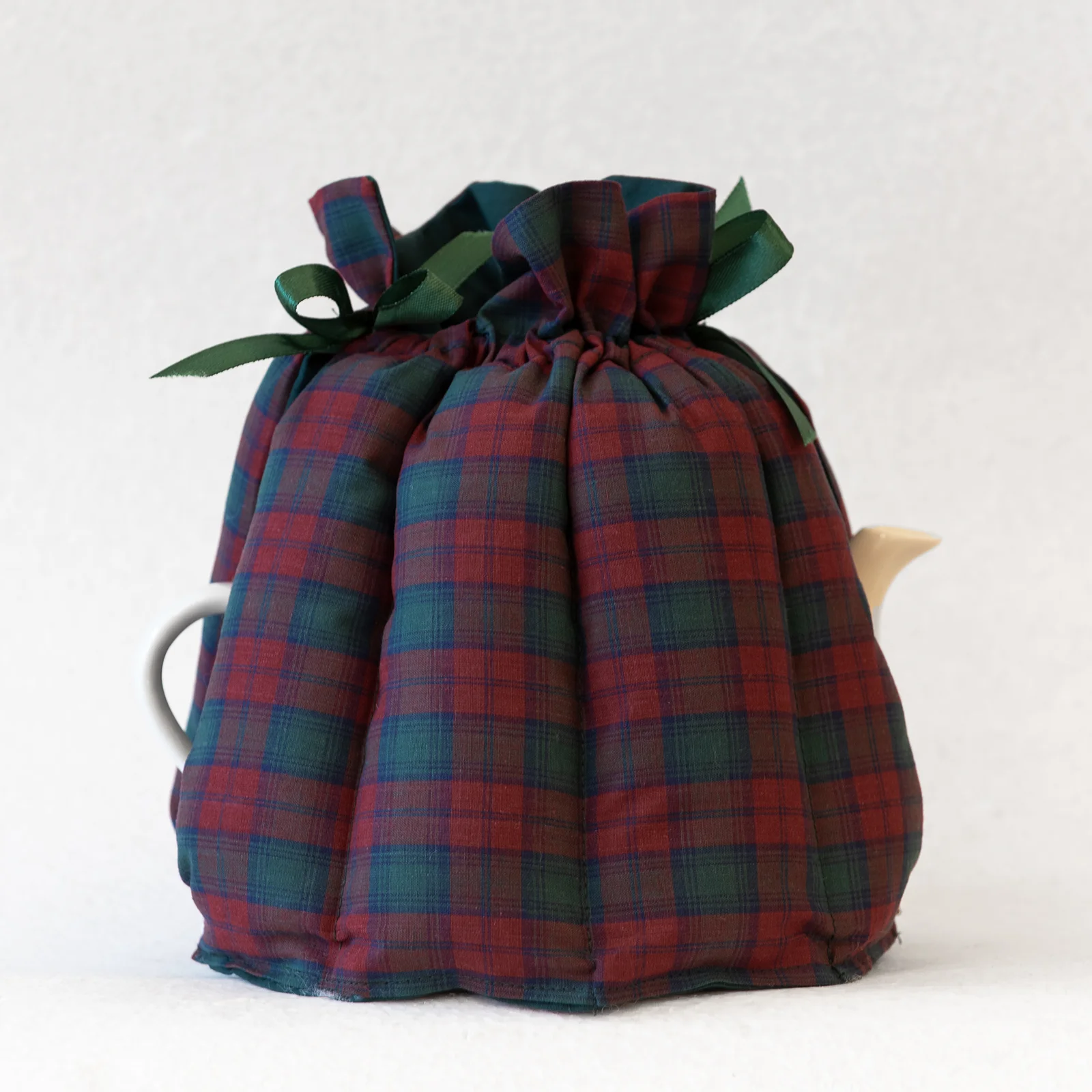 material tartan tea cosy