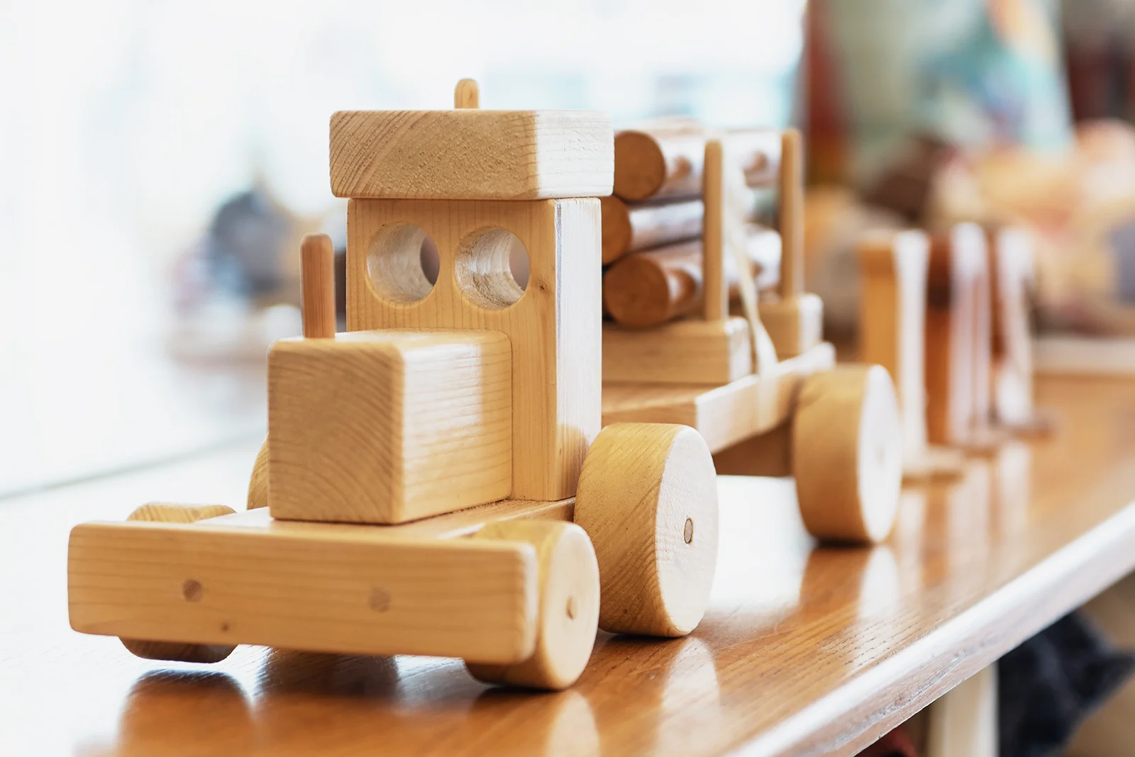 hand made wooden truck carrying wood