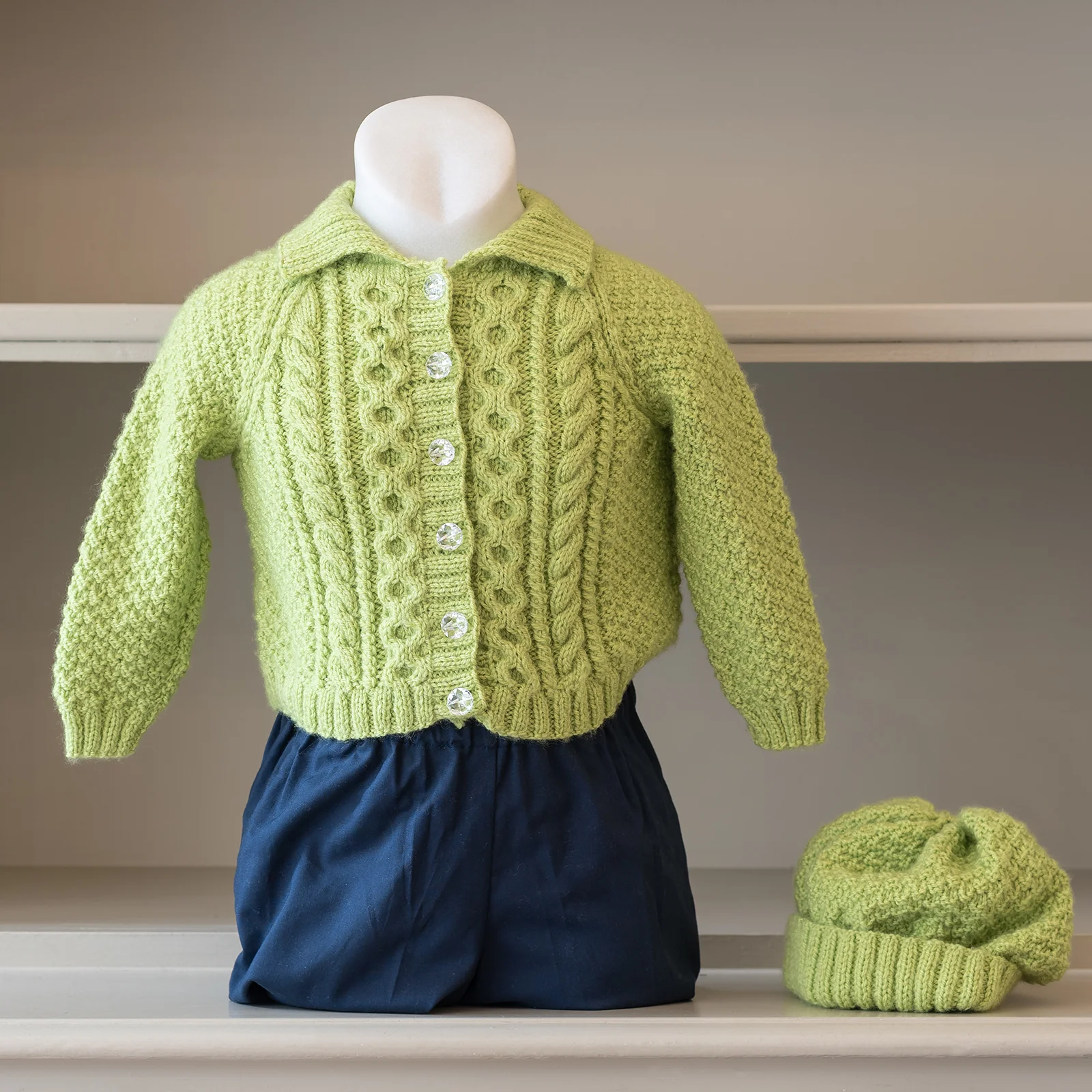 hand knitted green kids jumpers with hat