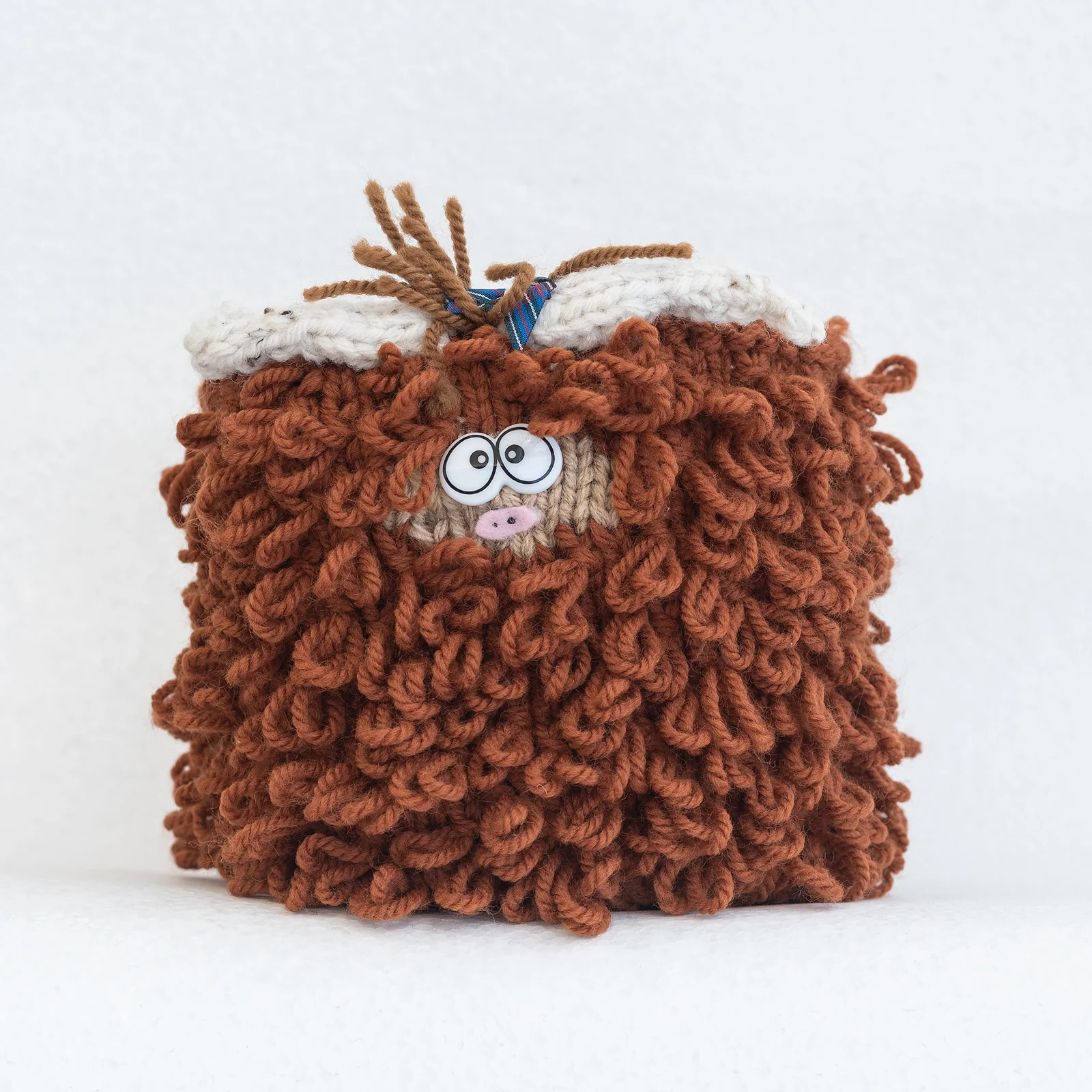 hand made knitted highland cow plant holder