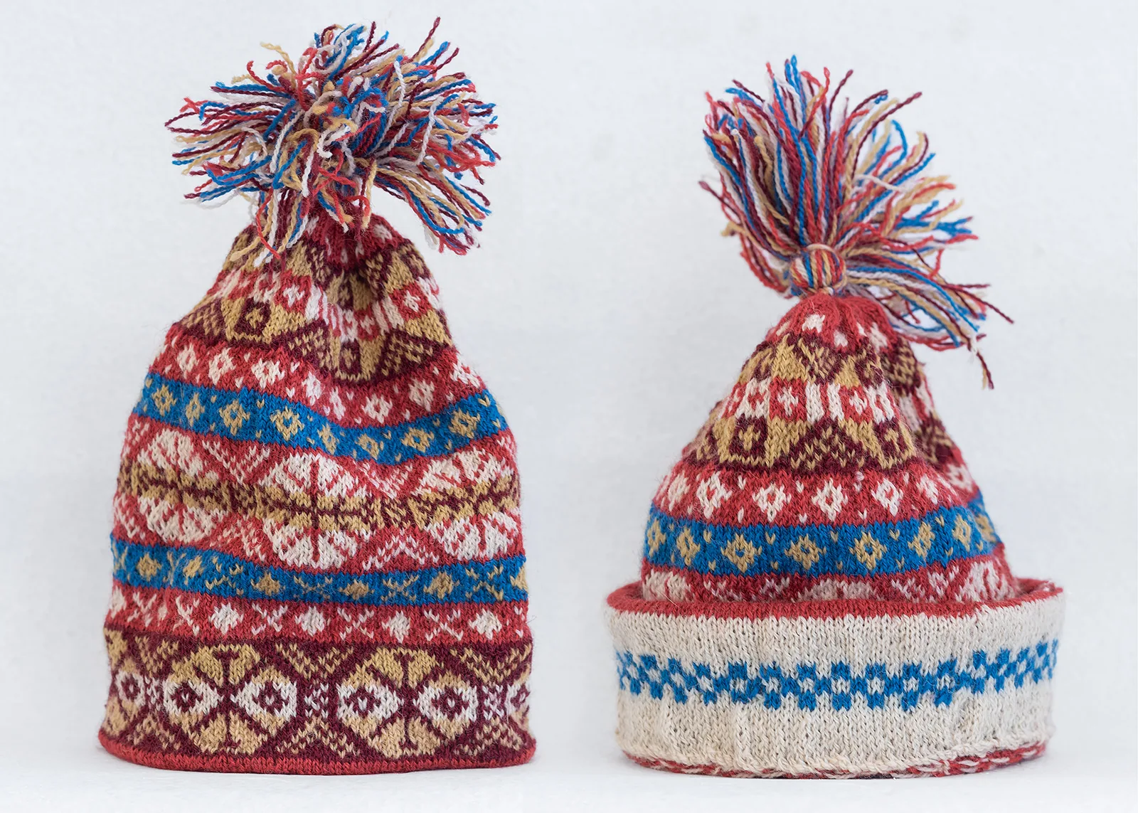 hand knitted wool pattern hats with pom pom